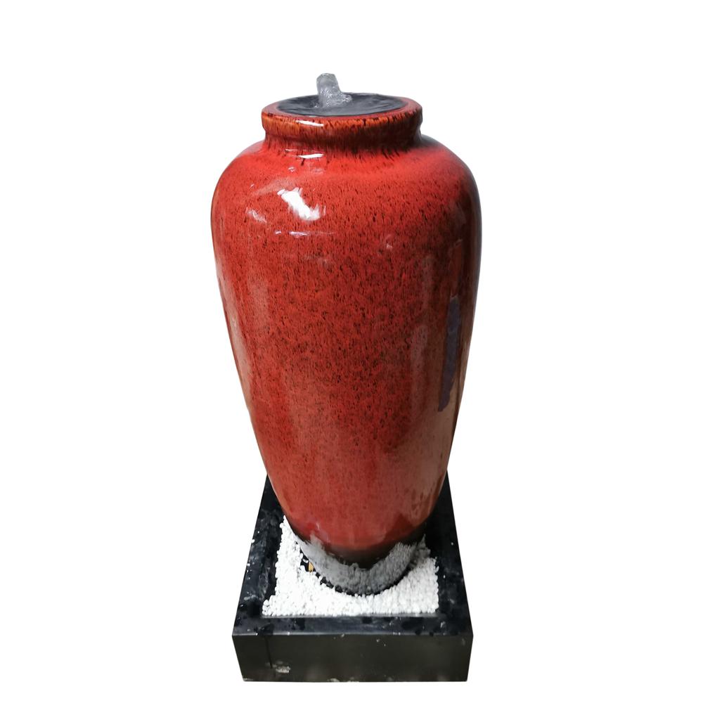 Red Bubbling Fountain With Base. Picture 1