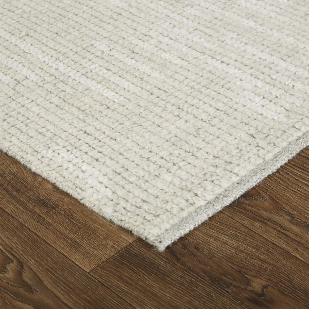 Alford Modern Solid, Ivory/Tan, 7'-9" x 9'-9" Area Rug. Picture 3