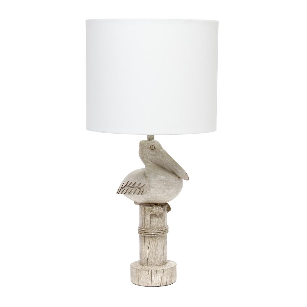 17.25" Tall Coastal Sitting Pelican Beige Wash Polyresin Bedside Table Desk Lamp. Picture 1