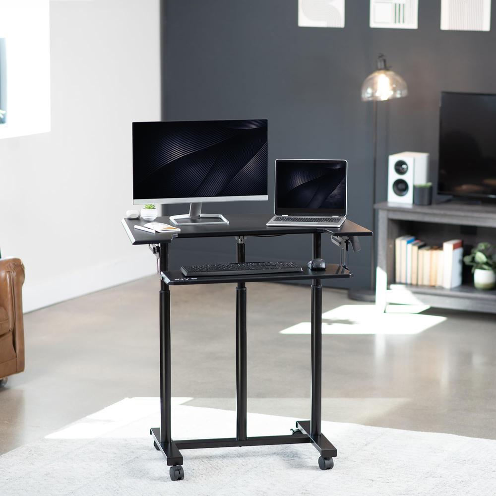 Mobile Height Adjustable Table, Stand Up Desk Cart with Sliding Keyboard Tray. Picture 2