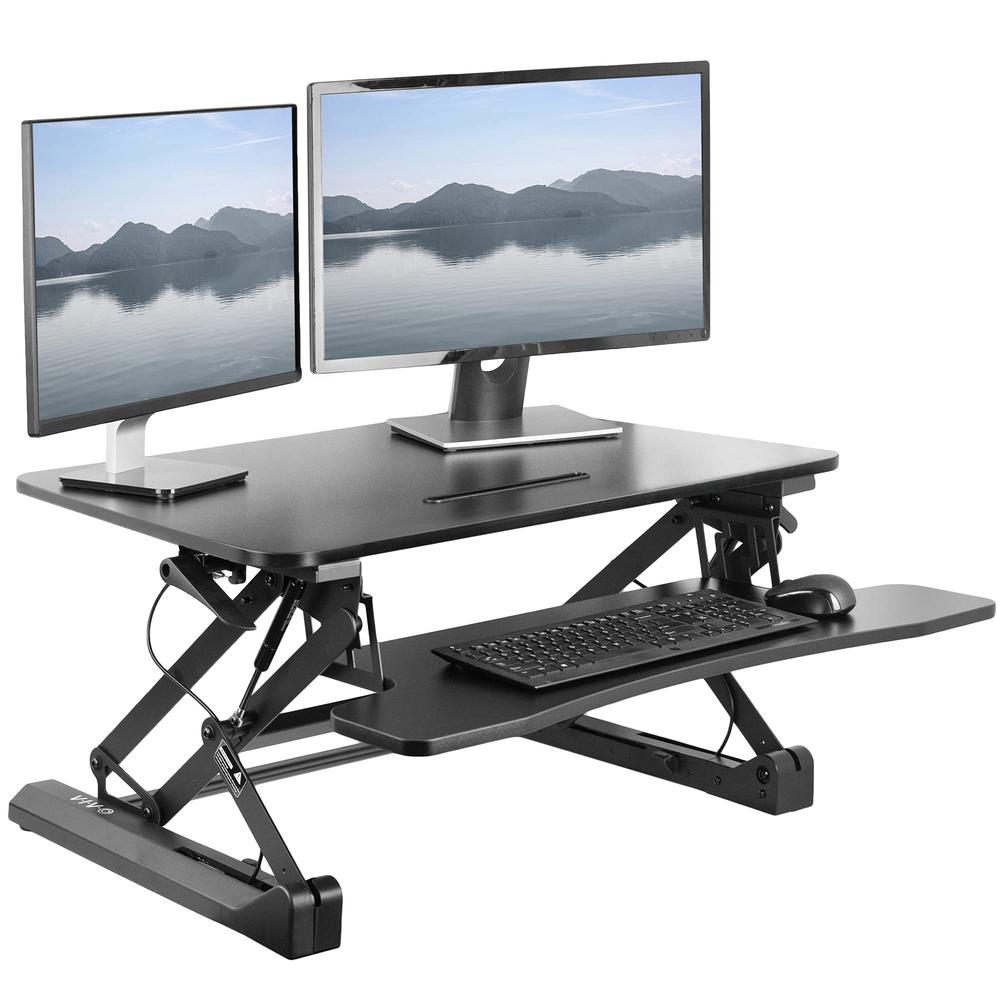 Black Deluxe Height Adjustable 36 inch Standing Desk Converter. Picture 1