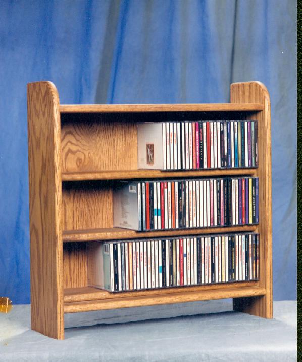 Solid Oak 3 Shelf CD Cabinet. Picture 1