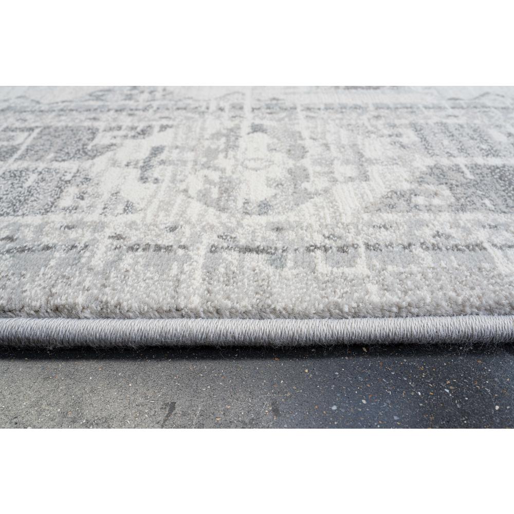 Essentials Whispers Ivory, Gray, and Beige Polypropylene Area Rug, 7'9" x 10'6". Picture 3