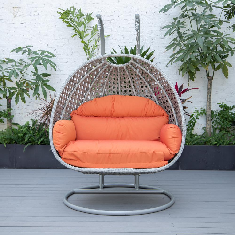LeisureMod Wicker Hanging 2 person Egg Swing Chair in Orange. Picture 4