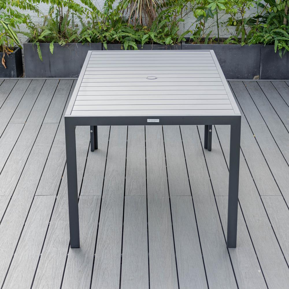 Chelsea Aluminum Outdoor Dining Table With 8 Chairs and Charcoal Black Cushions. Picture 15