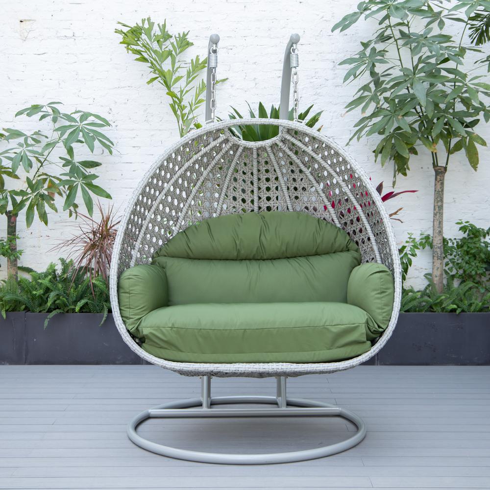 LeisureMod Wicker Hanging 2 person Egg Swing Chair in Dark Green. Picture 4