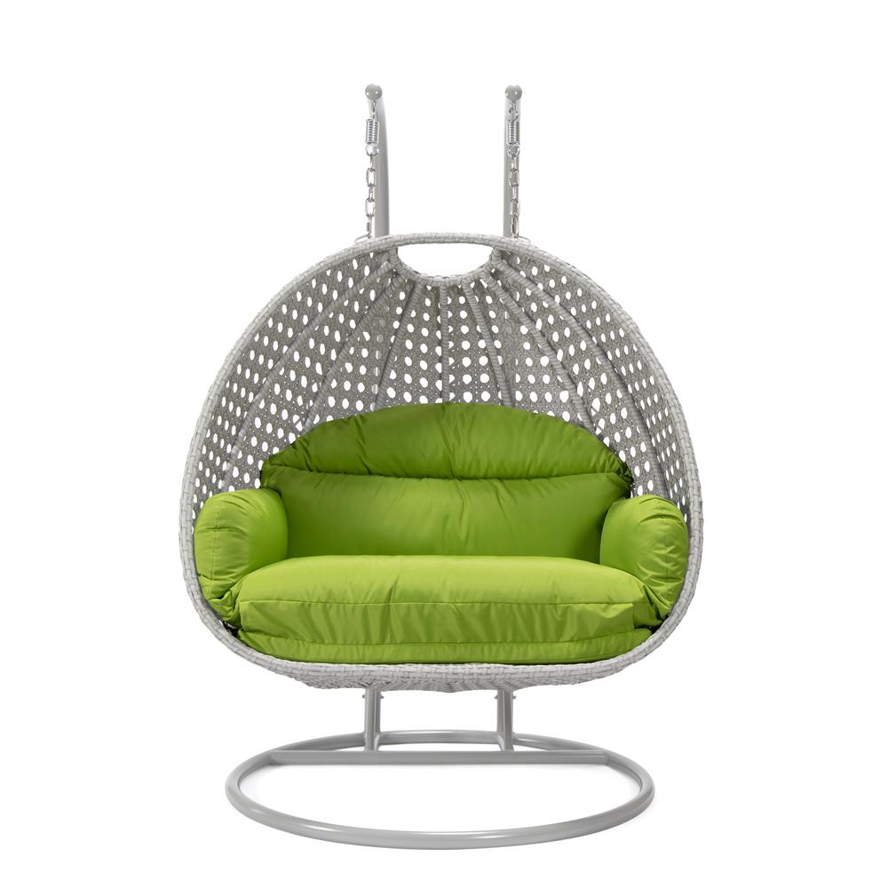 LeisureMod Wicker Hanging 2 person Egg Swing Chair in Light Green. Picture 1