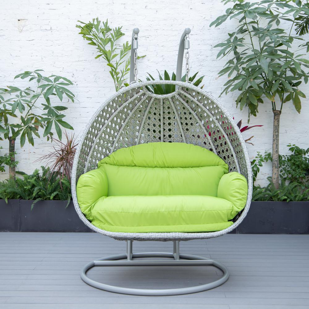 LeisureMod Wicker Hanging 2 person Egg Swing Chair in Light Green. Picture 4