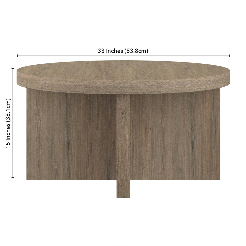 Elna 33" Wide Round Coffee Table in Antiqued Gray Oak. Picture 5