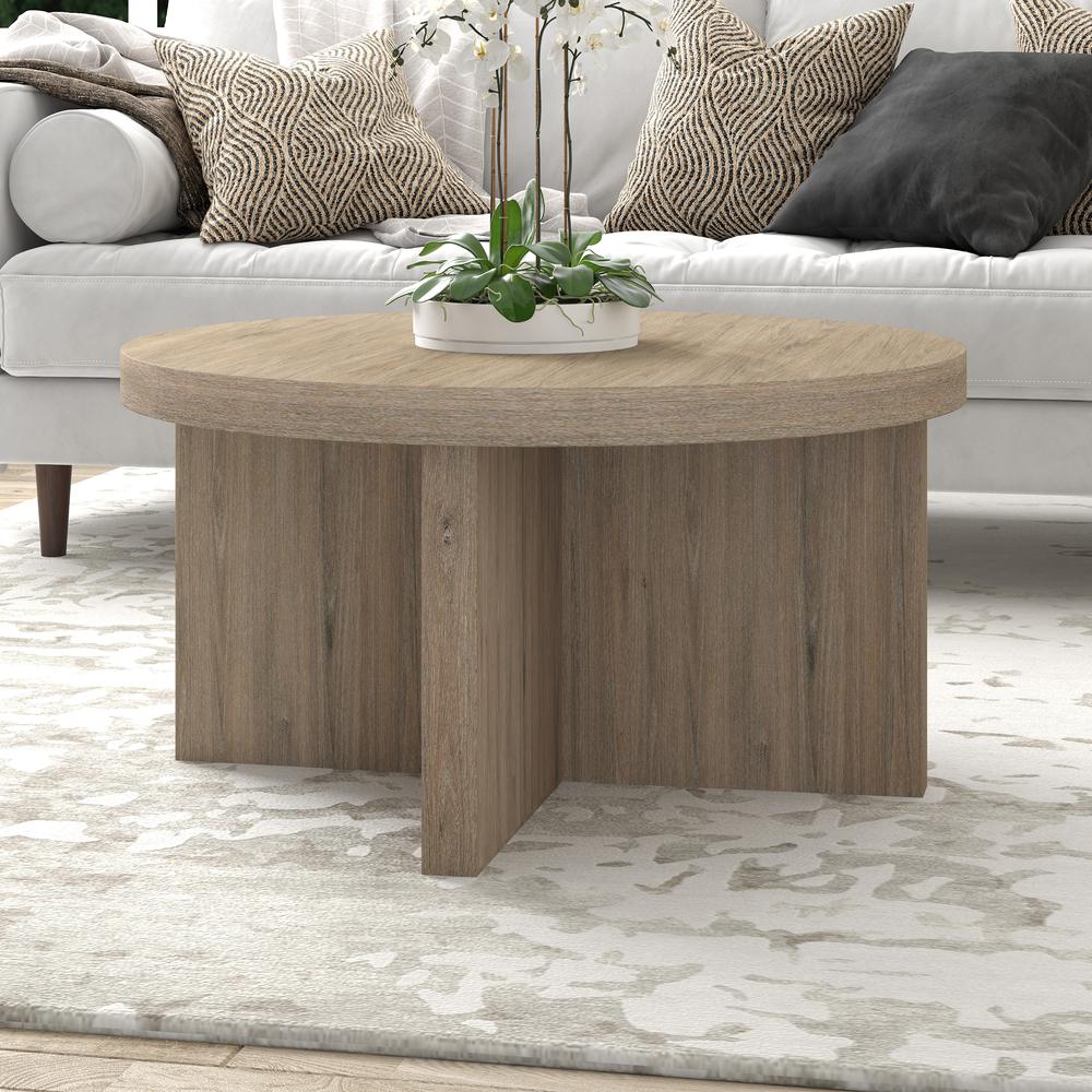 Elna 33" Wide Round Coffee Table in Antiqued Gray Oak. Picture 2