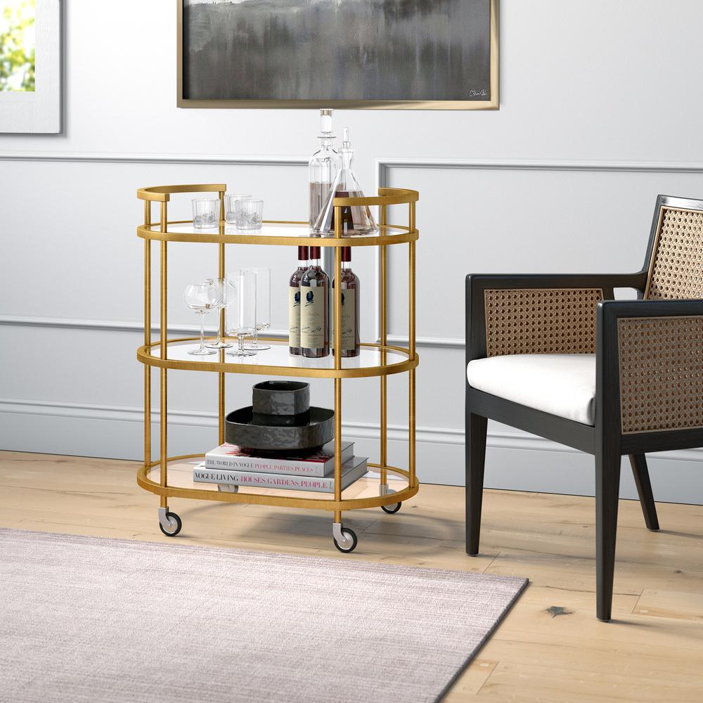 Leif 30'' Wide Oval Bar Cart in Brass. Picture 4