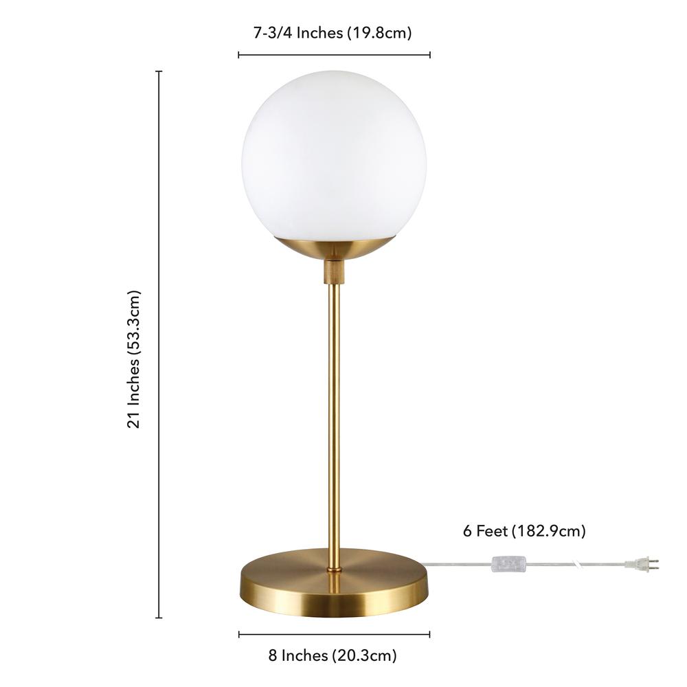 Theia 21" Tall Globe & Stem Table Lamp with Glass Shade in Brass/Clear. Picture 4