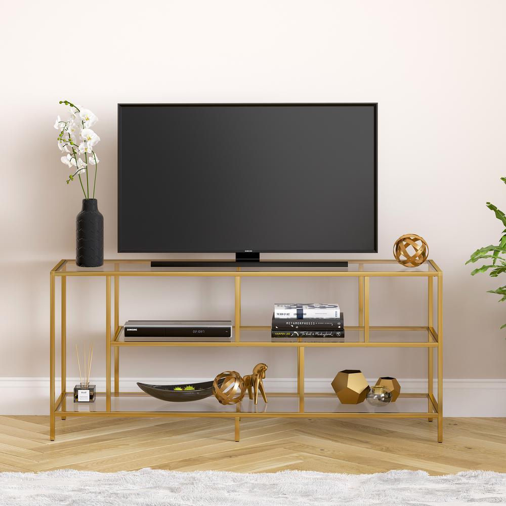 Winthrop Rectangular TV Stand with Glass Shelves for TV's up to 60" in Brass. Picture 4