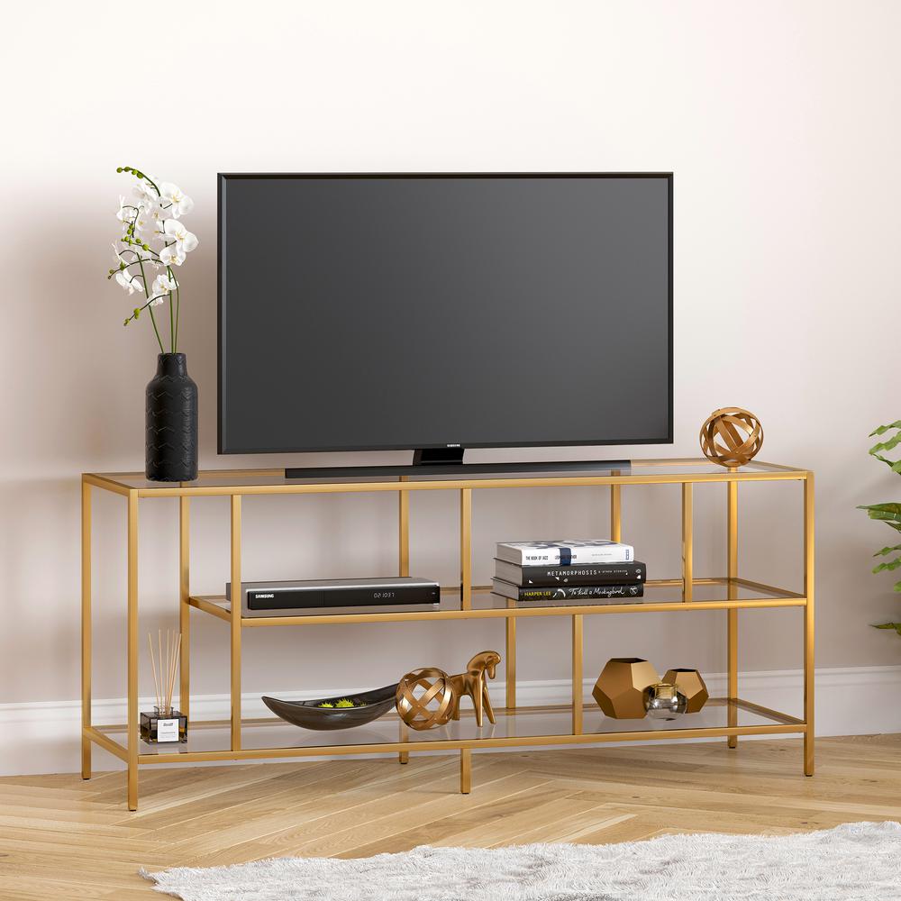 Winthrop Rectangular TV Stand with Glass Shelves for TV's up to 60" in Brass. Picture 2