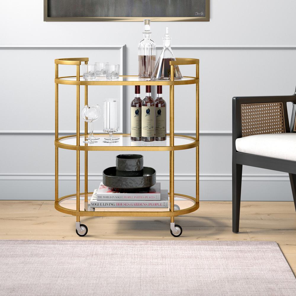 Leif 30'' Wide Oval Bar Cart in Brass. Picture 2