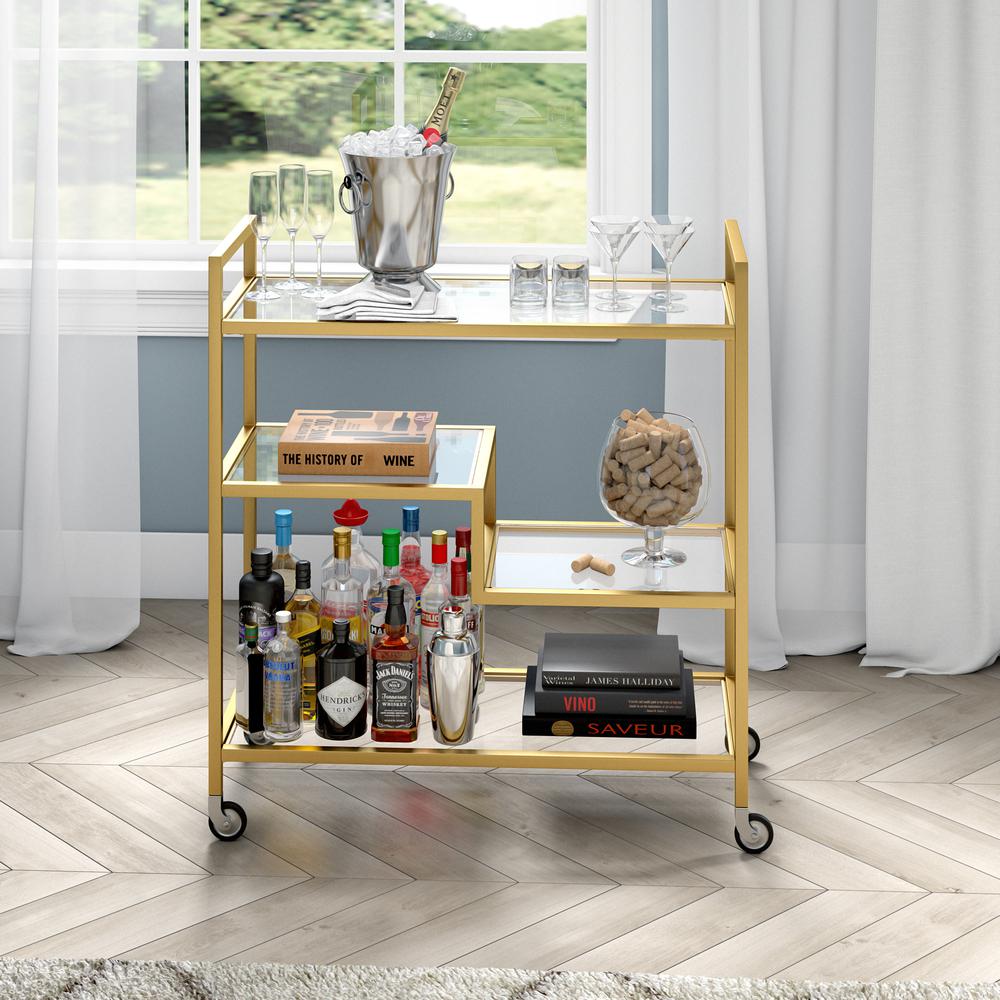 Lovett 33" Wide Rectangular Bar Cart with Glass Shelves in Brass. Picture 2
