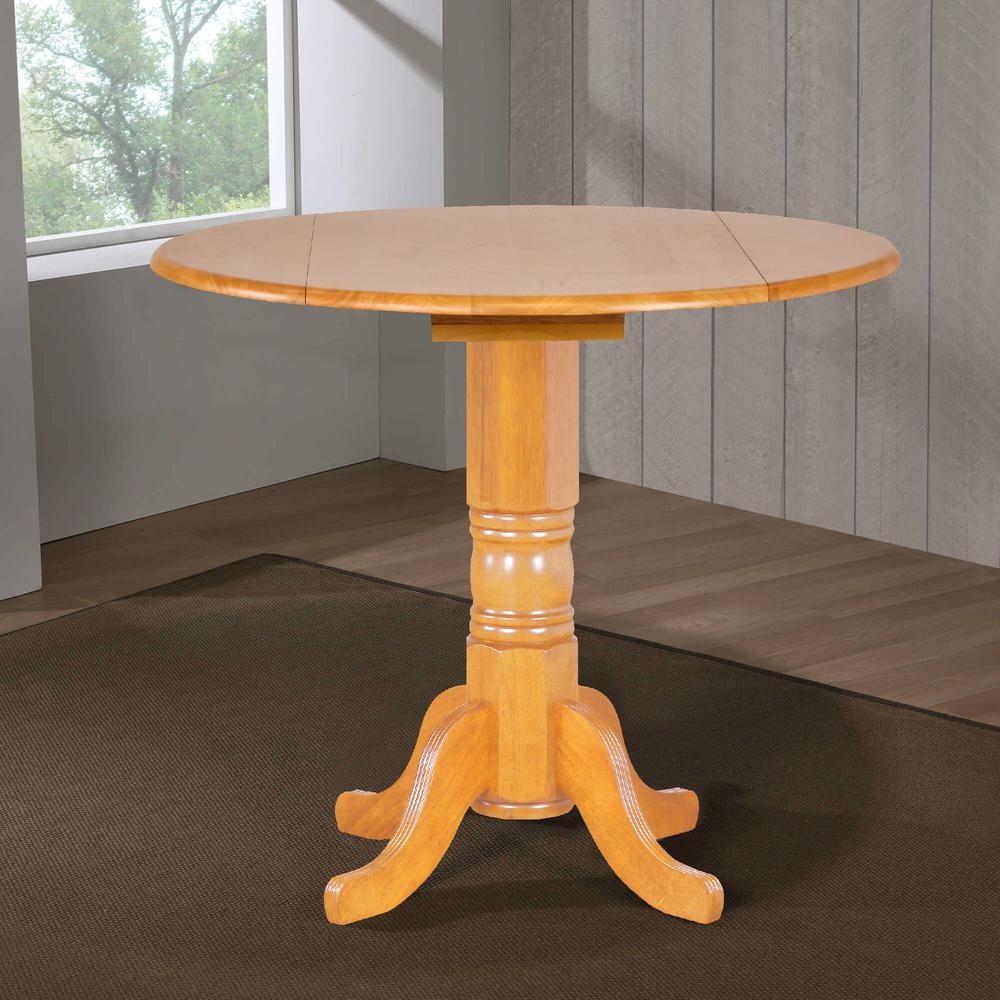 Selections 42 in. Round Extendable Pedestal Light Oak Wood Drop Leaf Dining Table (Seats 6). Picture 5