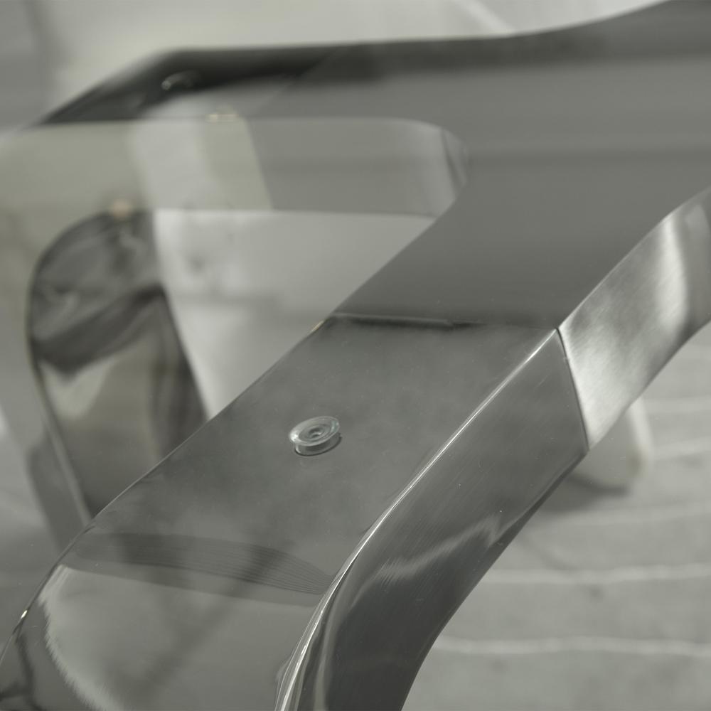 Designer Louis Lara's Cirrus table has polished base connector with brushed stainless steel and 15mm Tempered glass Top Clear. Picture 2