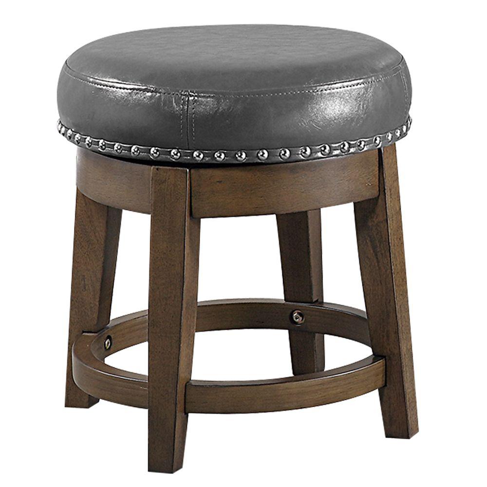 Poundex 18" Round Swivel Stool in Gray Faux Leather (Set of 2), 18" Dia x 18" H, Package Weight 42. Picture 1