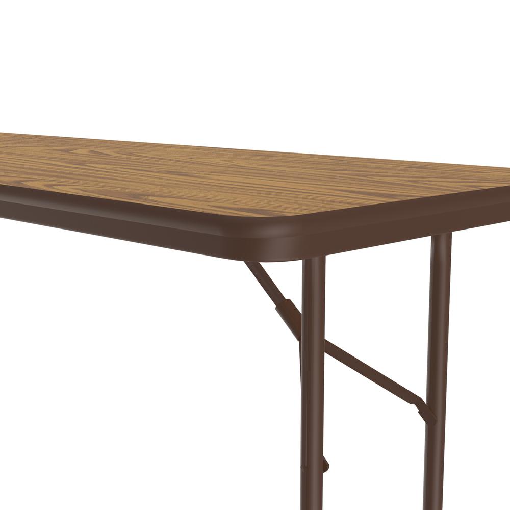 Deluxe High Pressure Top Folding Table, 24x72" RECTANGULAR MED OAK BROWN. Picture 7