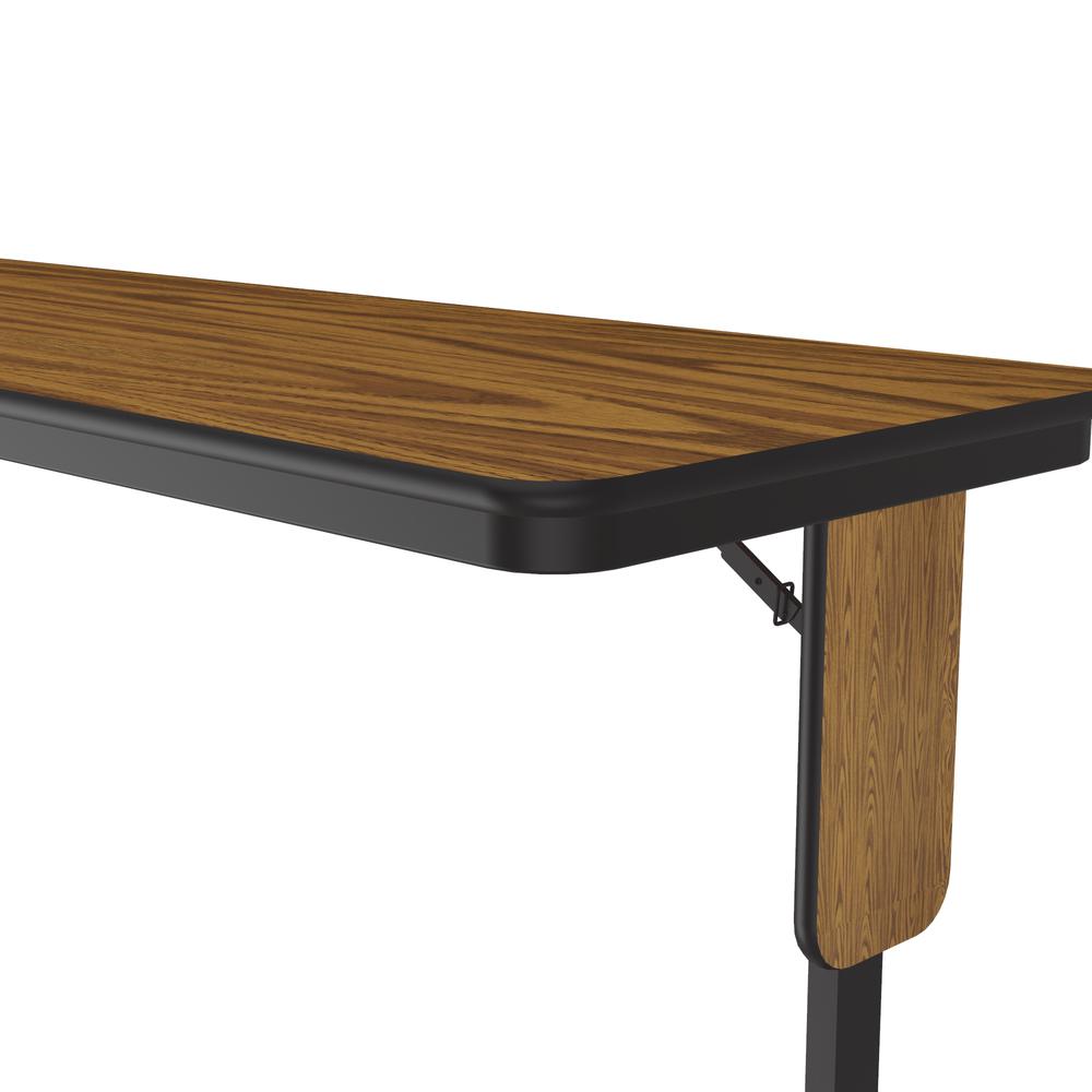 Deluxe High-Pressure Folding Seminar Table with Panel Leg 24x72" RECTANGULAR MED OAK, BLACK. Picture 5