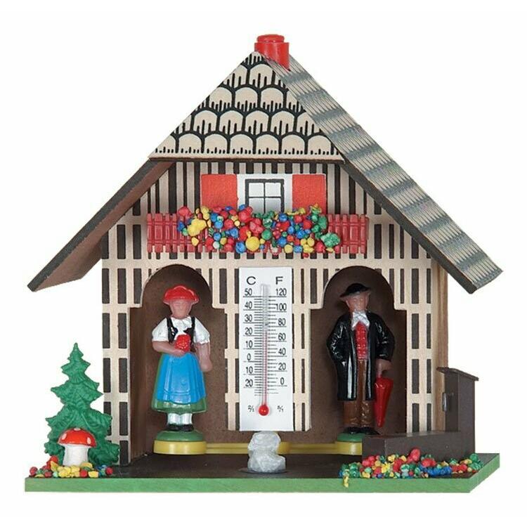 German Weatherhouse with Man and Woman, Tree, and Mushroom. Picture 1
