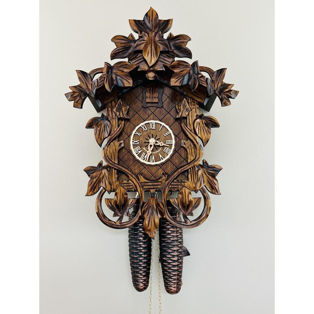 Eight Day Cuckoo Clock with Hand-carved Vines and Leaves. Picture 1