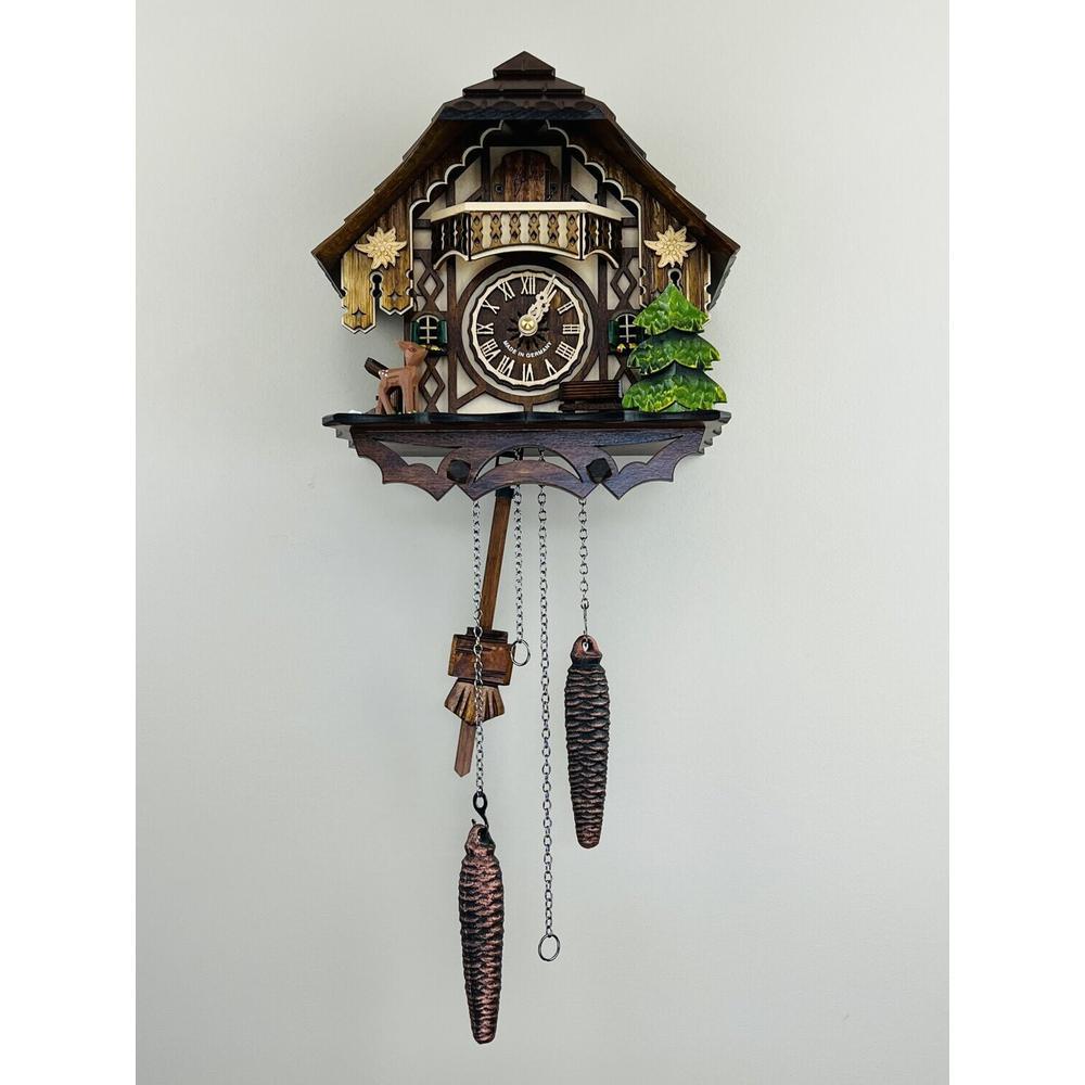 Musical Cuckoo Clock Cottage with Deer, Water Pump, and Tree. Picture 1