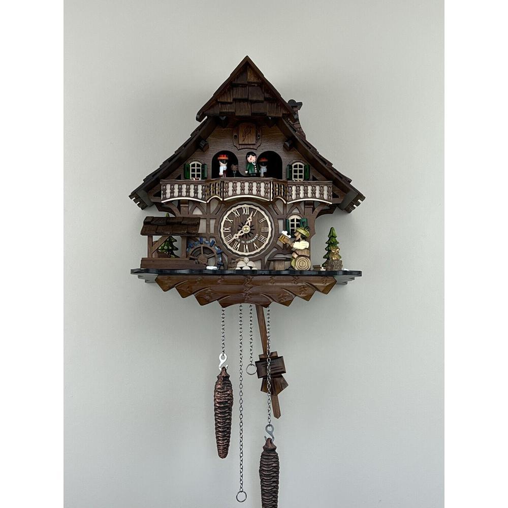 Musical Black Forest Cuckoo Clock with Dancers, Waterwheel, and Beer Drinker. Picture 1