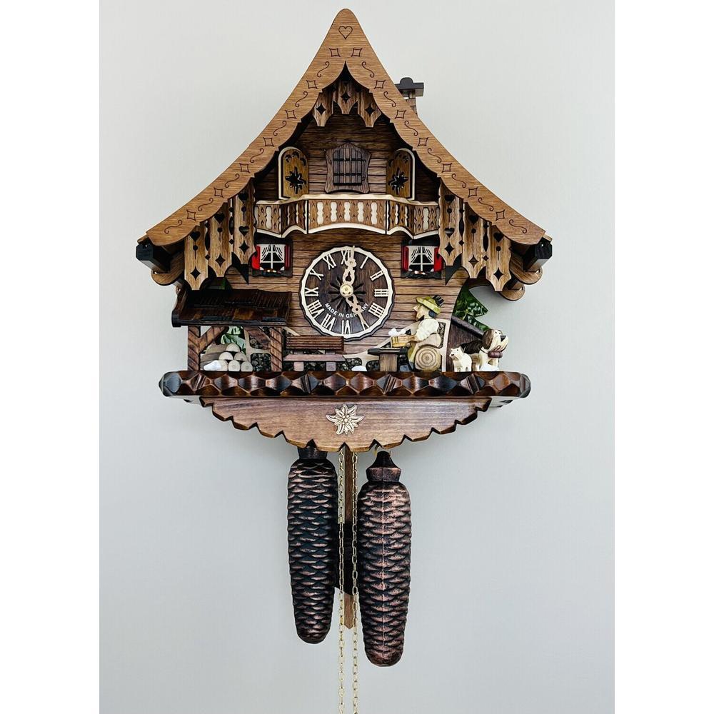 Eight Day Cuckoo Clock Chalet with Beer Drinker. Picture 1