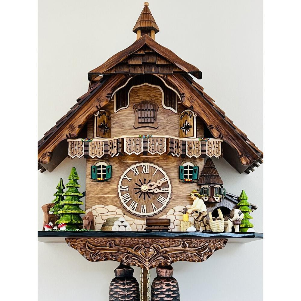 Eight Day Cuckoo Clock  - Cottage, Turret, Man Chopping Wood. Picture 3