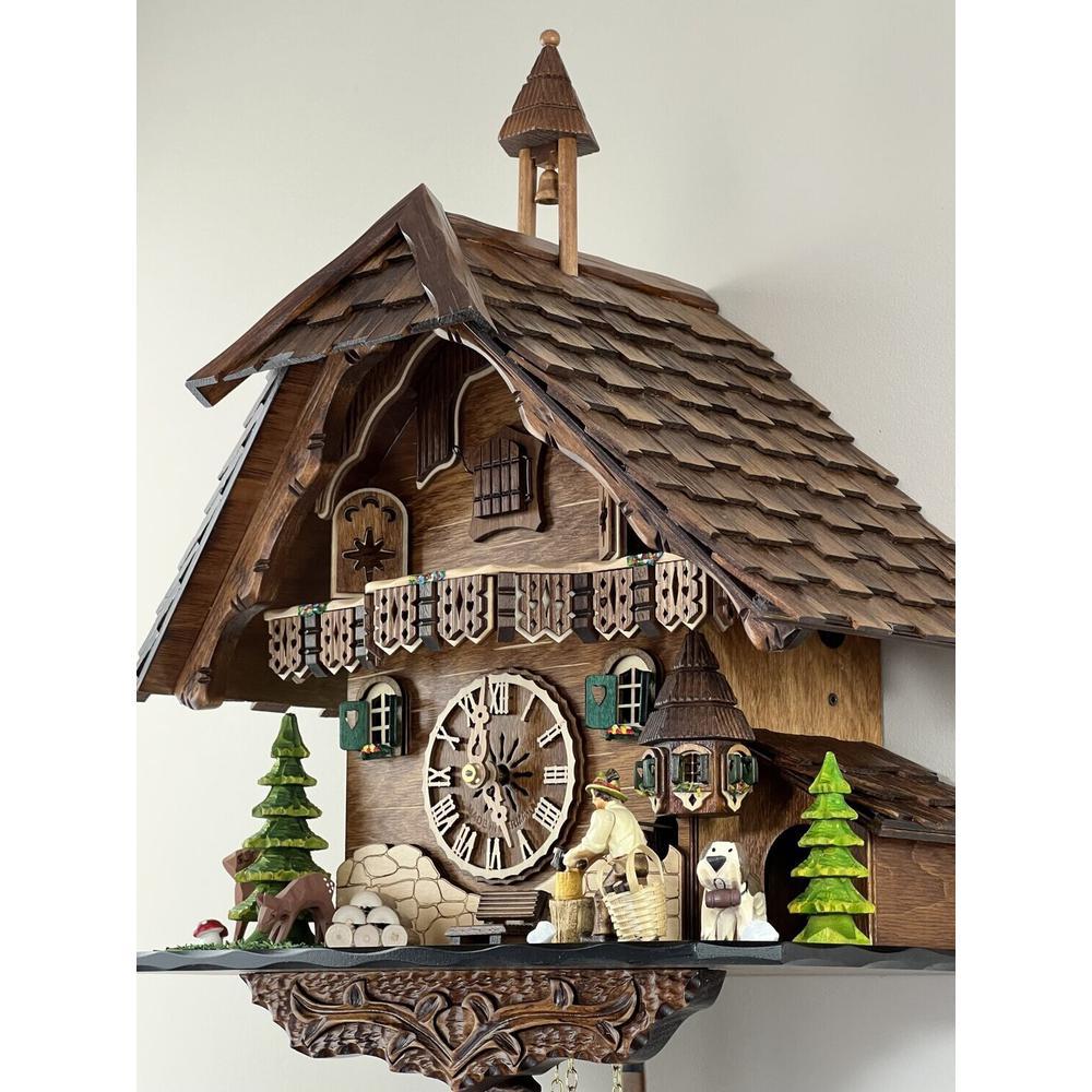 Eight Day Cuckoo Clock  - Cottage, Turret, Man Chopping Wood. Picture 2