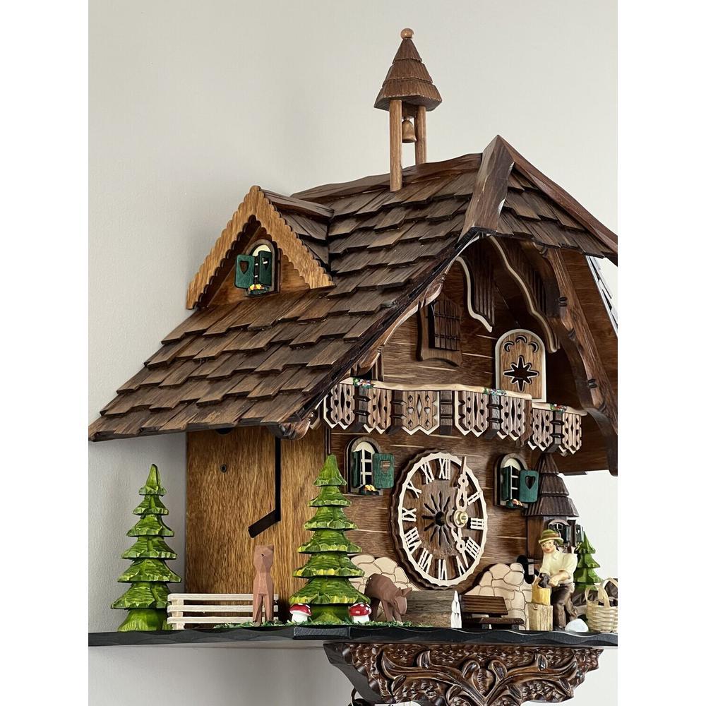 Eight Day Cuckoo Clock  - Cottage, Turret, Man Chopping Wood. Picture 4