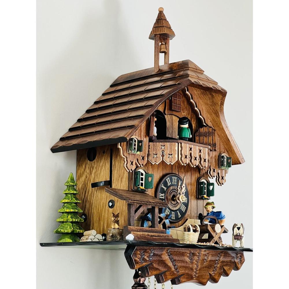 One Day Musical Cuckoo Clock Cottage with Man Sawing Wood. Picture 4