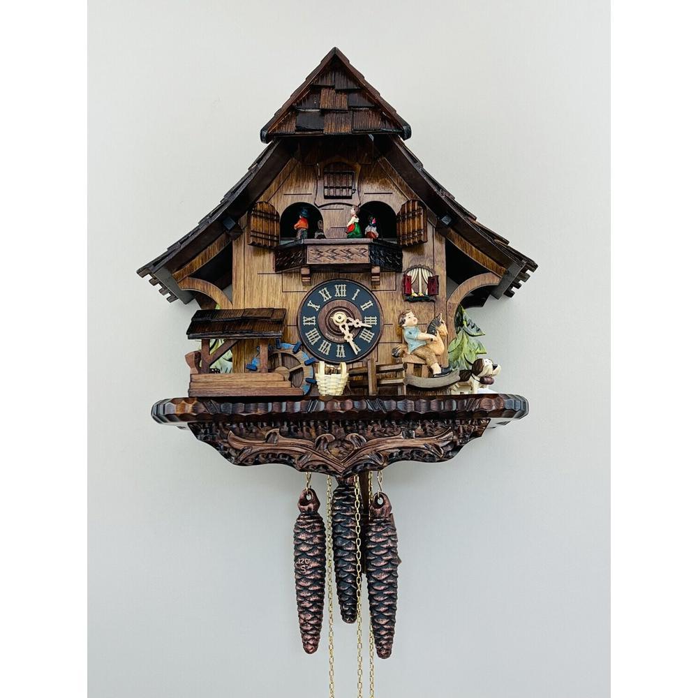 One Day Musical Cuckoo Clock Cottage with Boy on Rocking Horse. Picture 1