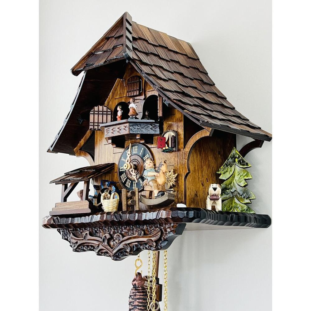 One Day Musical Cuckoo Clock Cottage with Boy on Rocking Horse. Picture 2