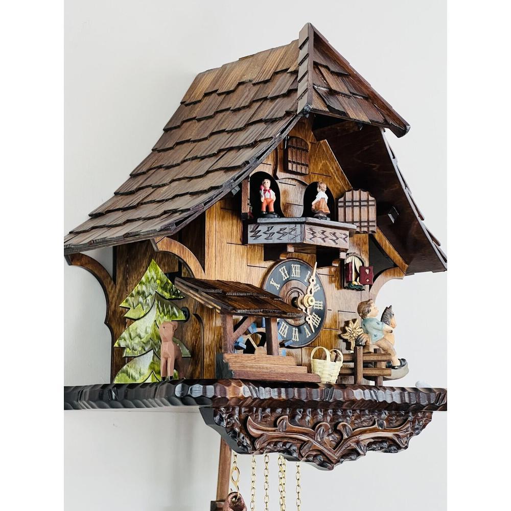 One Day Musical Cuckoo Clock Cottage with Boy on Rocking Horse. Picture 4