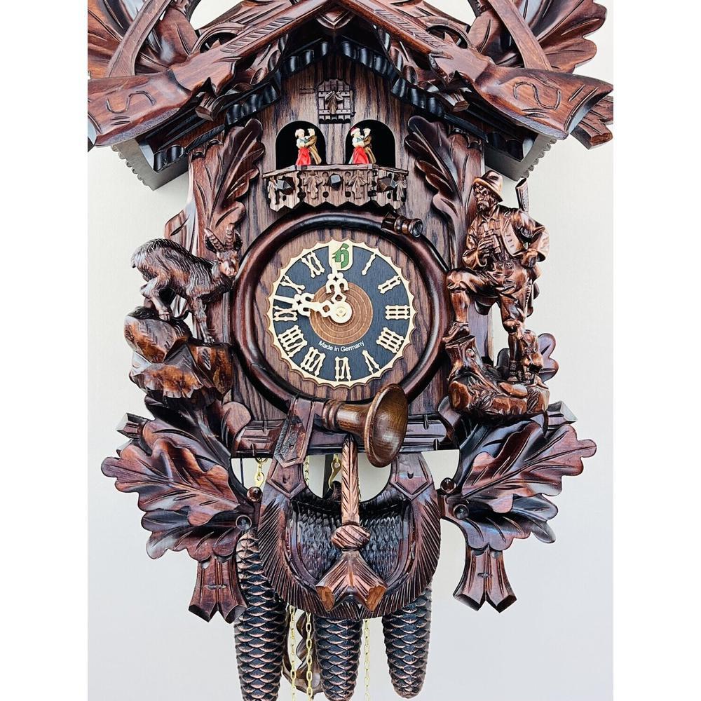 Eight Day Musical Cuckoo Clock Hunter's Style with Carved Woodsman and Stag. Picture 3