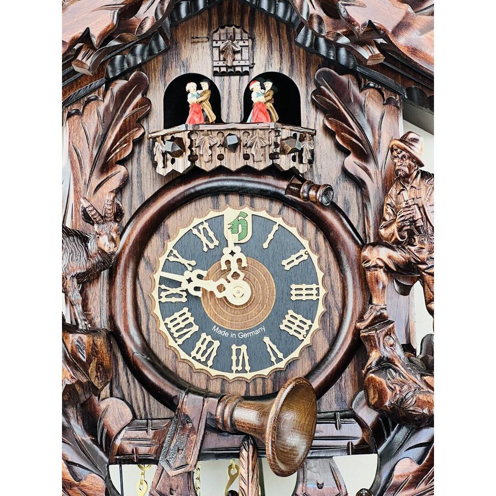 Eight Day Musical Cuckoo Clock Hunter's Style with Carved Woodsman and Stag. Picture 4