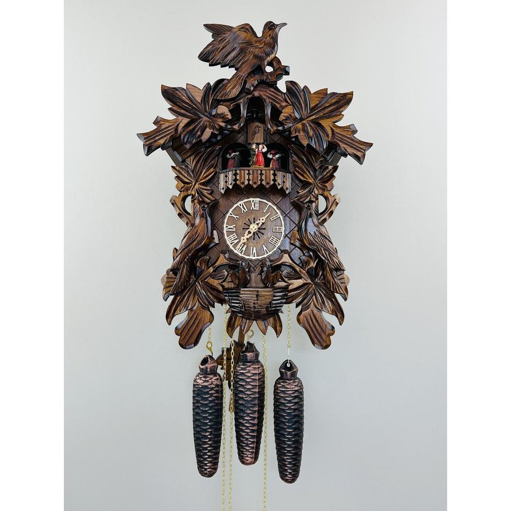 Eight Day Musical Cuckoo Clock with Hand-carved Birds Leaves, and Chicks in Nest. Picture 1