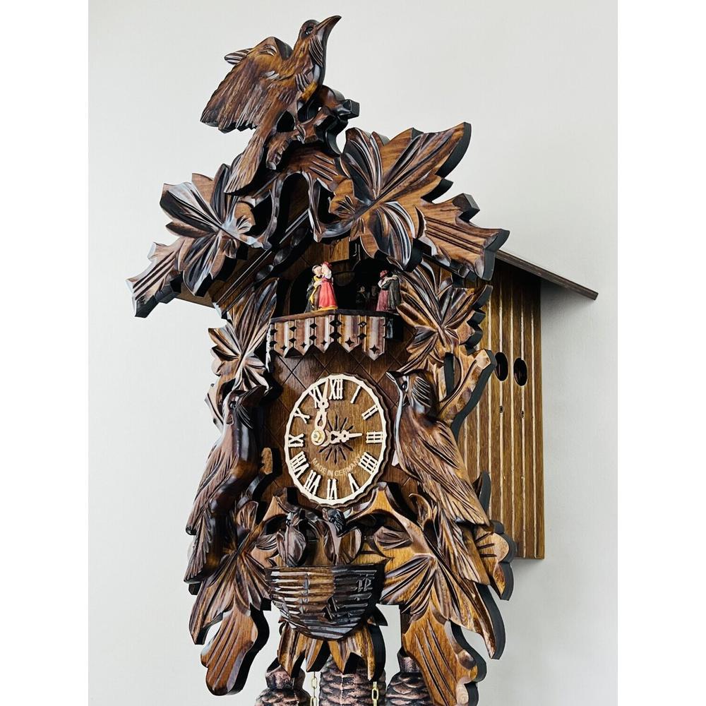 Eight Day Musical Cuckoo Clock with Hand-carved Birds Leaves, and Chicks in Nest. Picture 2