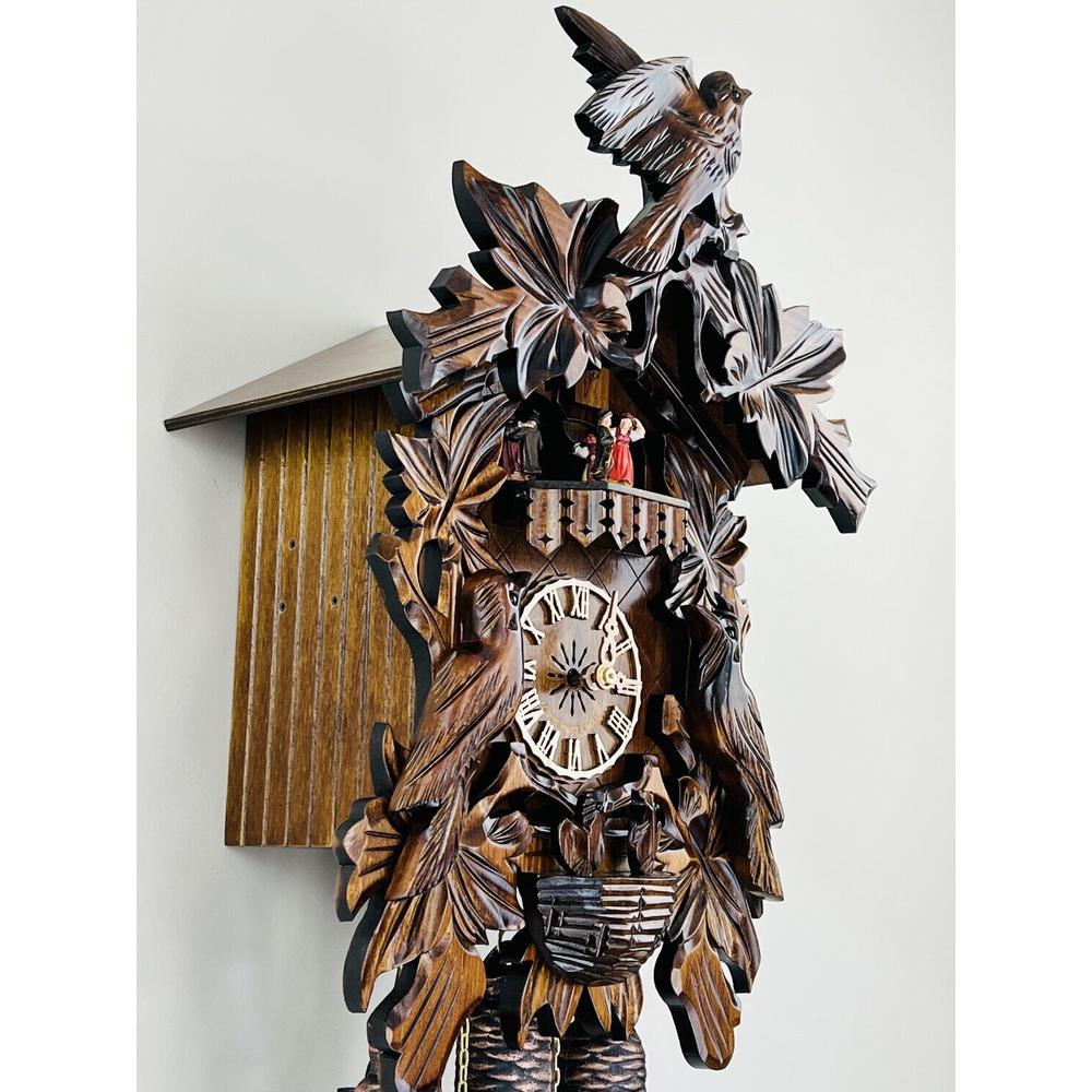 Eight Day Musical Cuckoo Clock with Hand-carved Birds Leaves, and Chicks in Nest. Picture 4