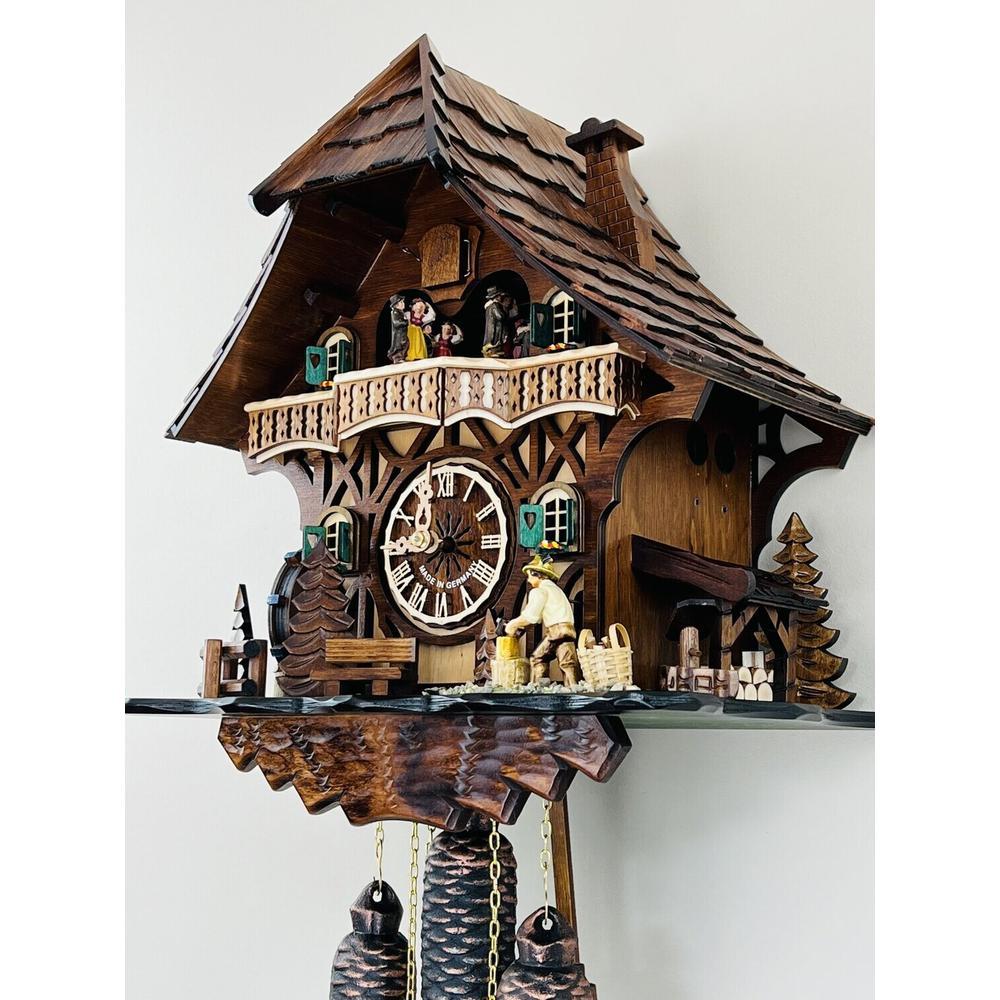 Eight Day Musical Cuckoo Clock Cottage with Woodchopper and Waterwheel. Picture 2