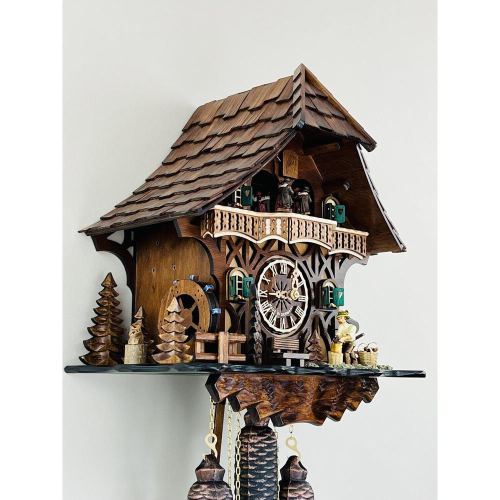 Eight Day Musical Cuckoo Clock Cottage with Woodchopper and Waterwheel. Picture 4