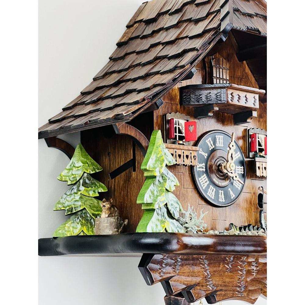 Eight Day Cuckoo Clock Cottage - Fisherman Raises Fishing Pole. Picture 4