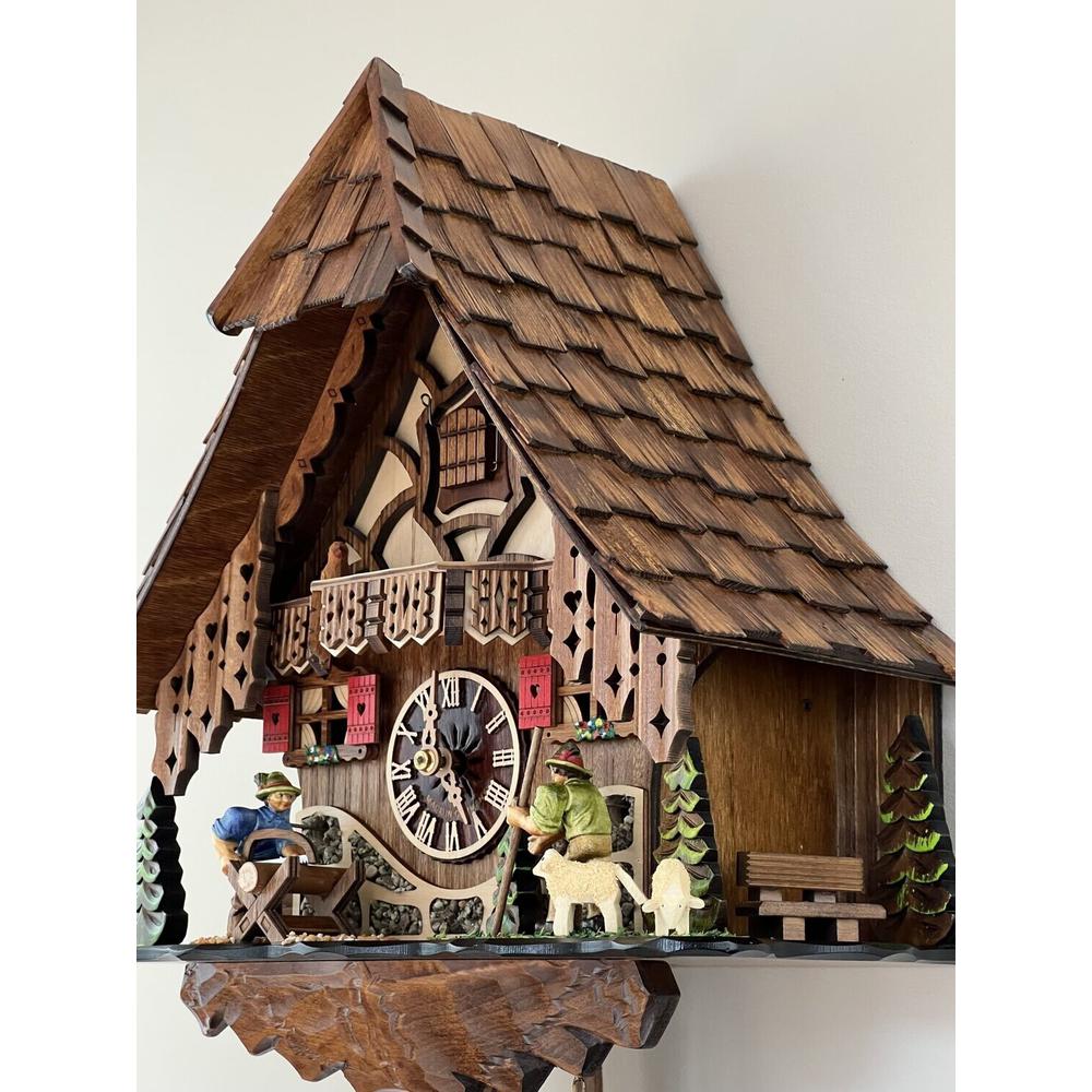 Eight Day Cuckoo Clock Moving Man Saws Wood and Volksmarcher. Picture 3