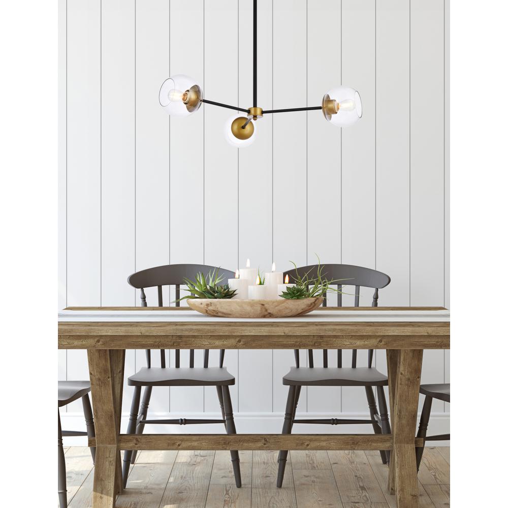 Briggs 32 Inch Pendant In Black And Brass With Clear Shade. Picture 8