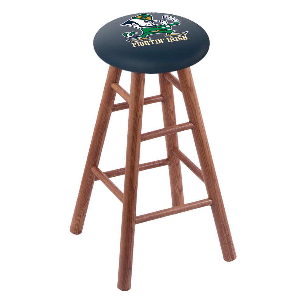 Oak Extra Tall Bar Stool in Medium Finish with Notre Dame (Leprechaun) Seat. Picture 1