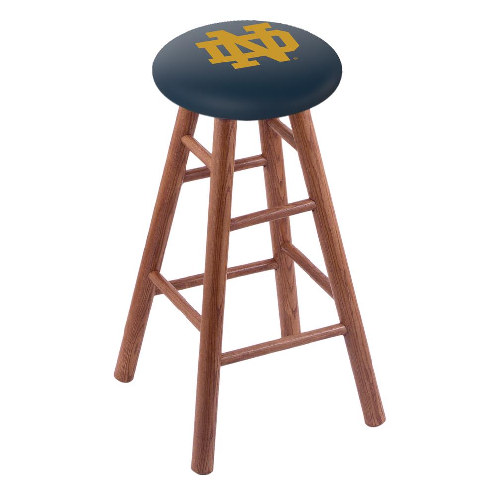 Oak Extra Tall Bar Stool in Medium Finish with Notre Dame (ND) Seat. Picture 1
