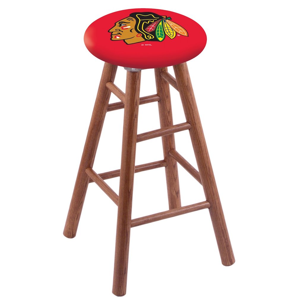 Oak Extra Tall Bar Stool in Medium Finish with Chicago Blackhawks Seat. Picture 1